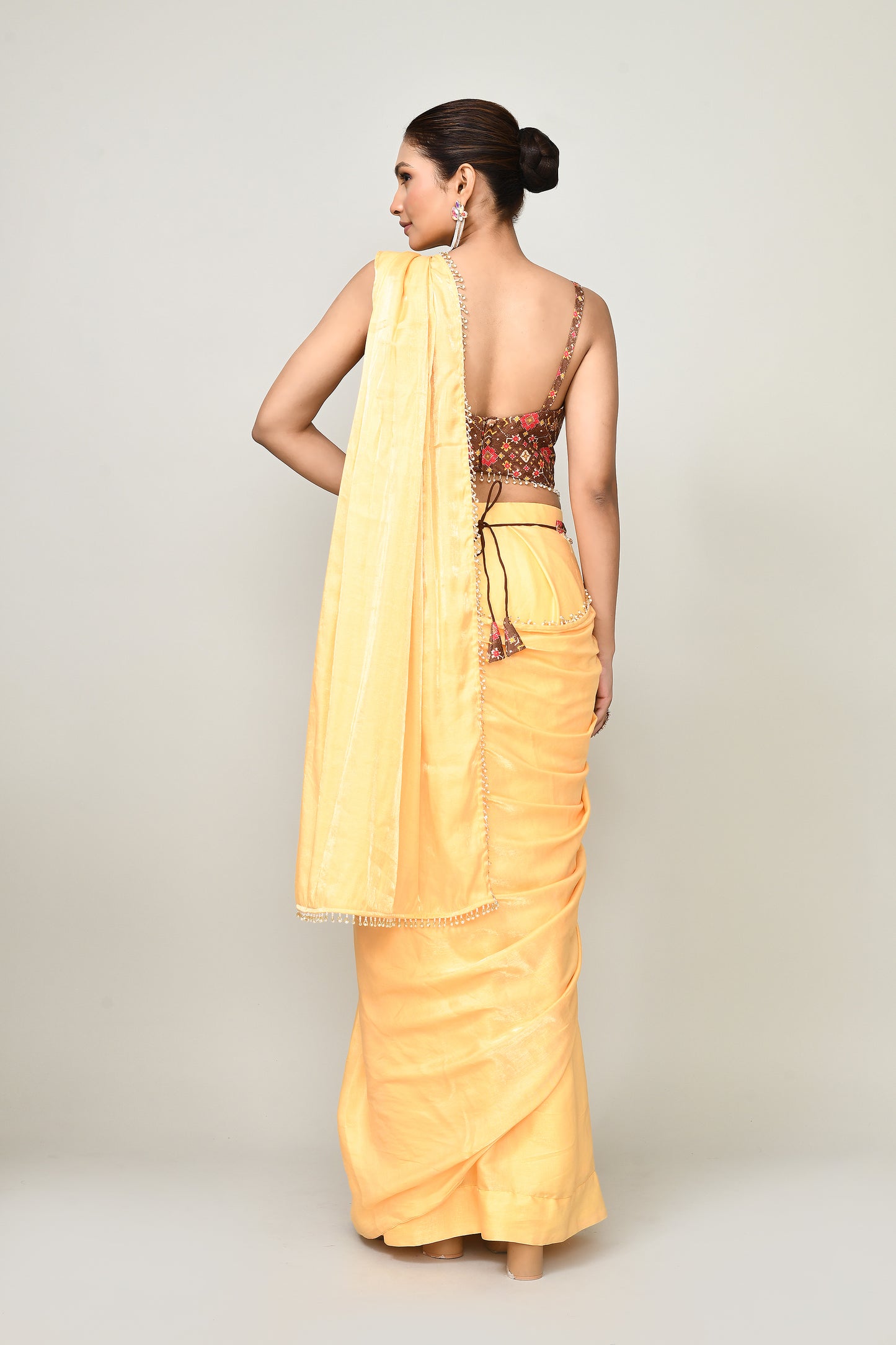 Designer Wear Yellow Simmer Drape Saree