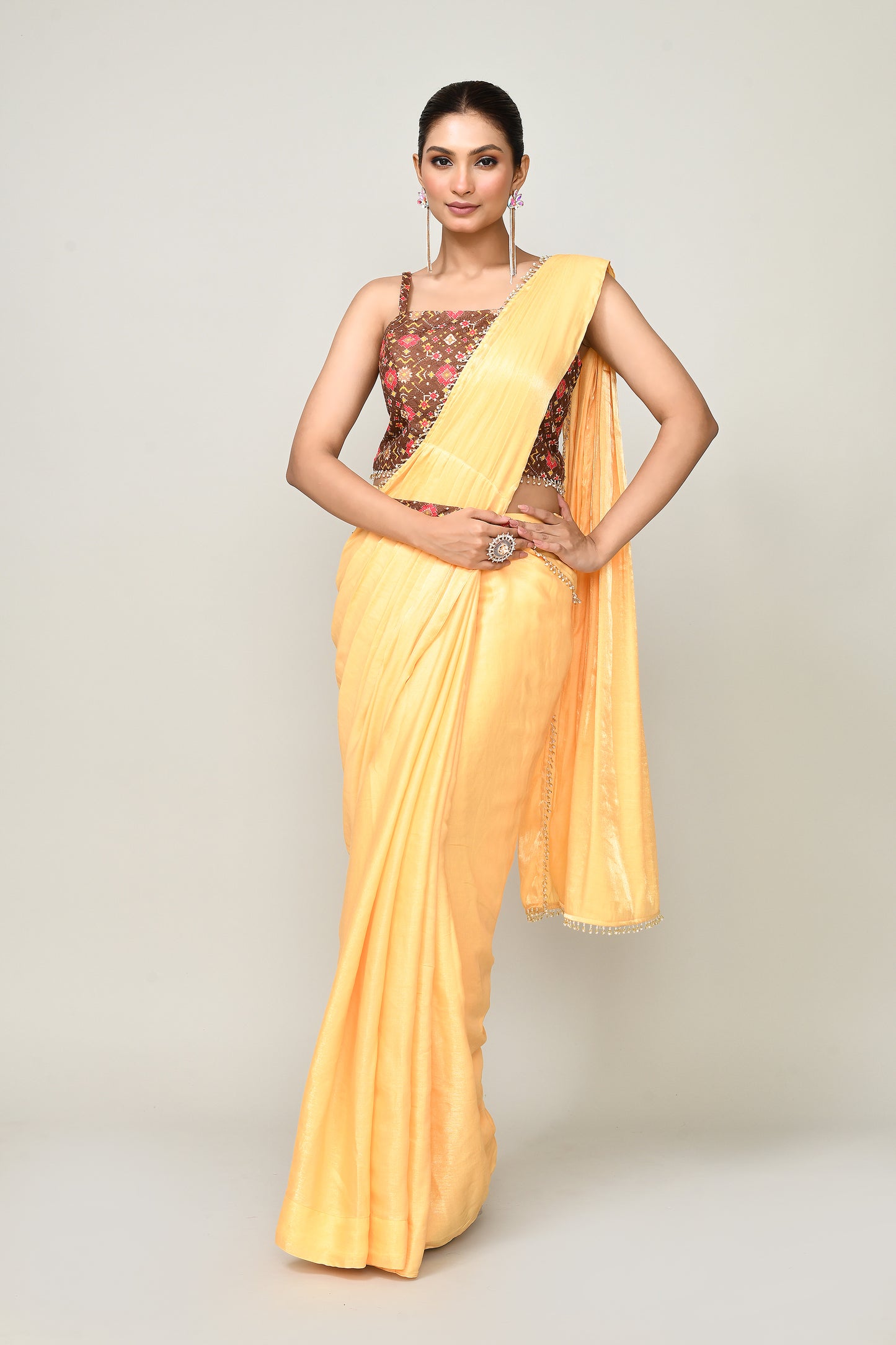Designer Wear Yellow Simmer Drape Saree