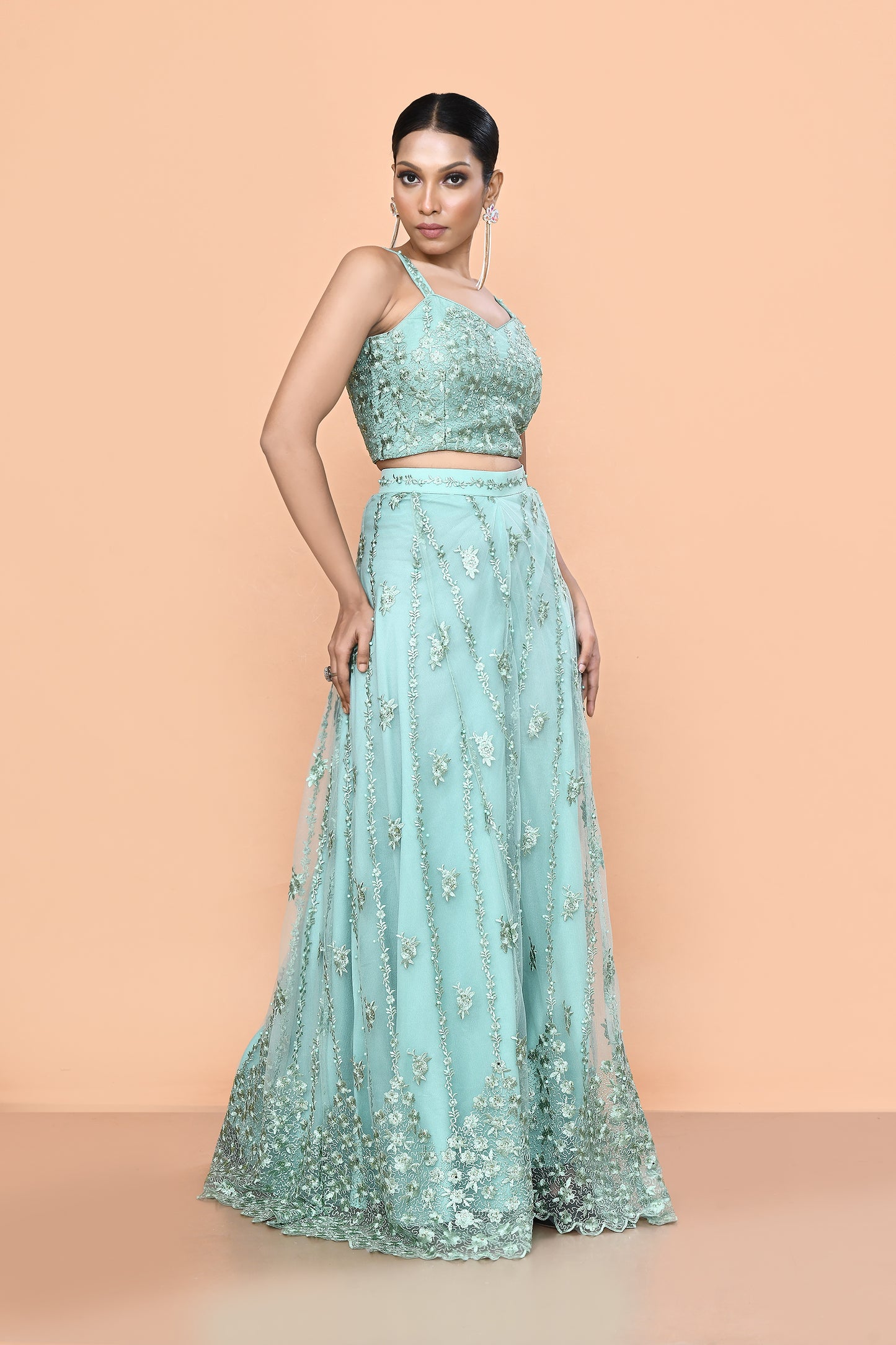 Designer Wear Sea Green Net Embroidered Lehenga Set