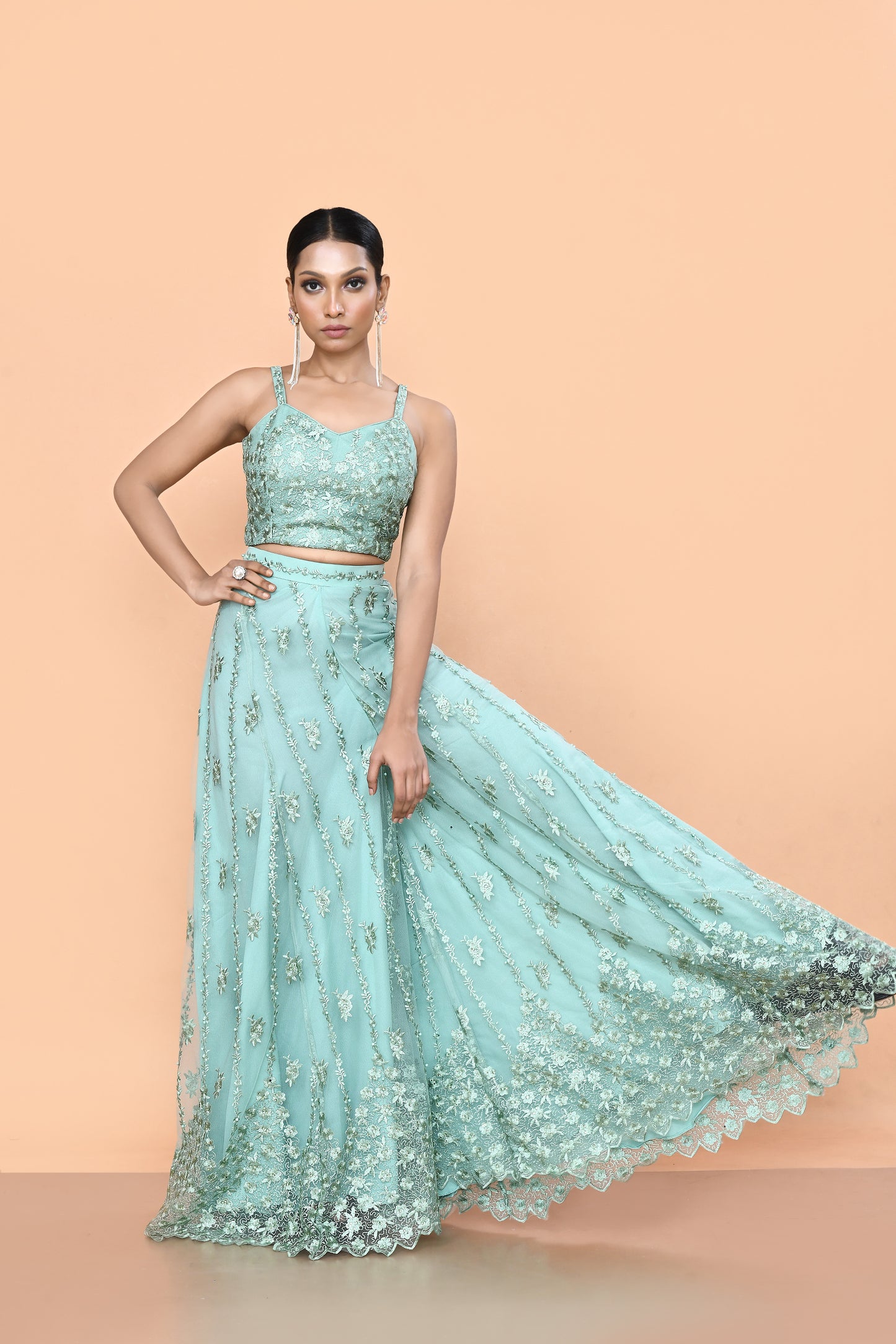 Designer Wear Sea Green Net Embroidered Lehenga Set