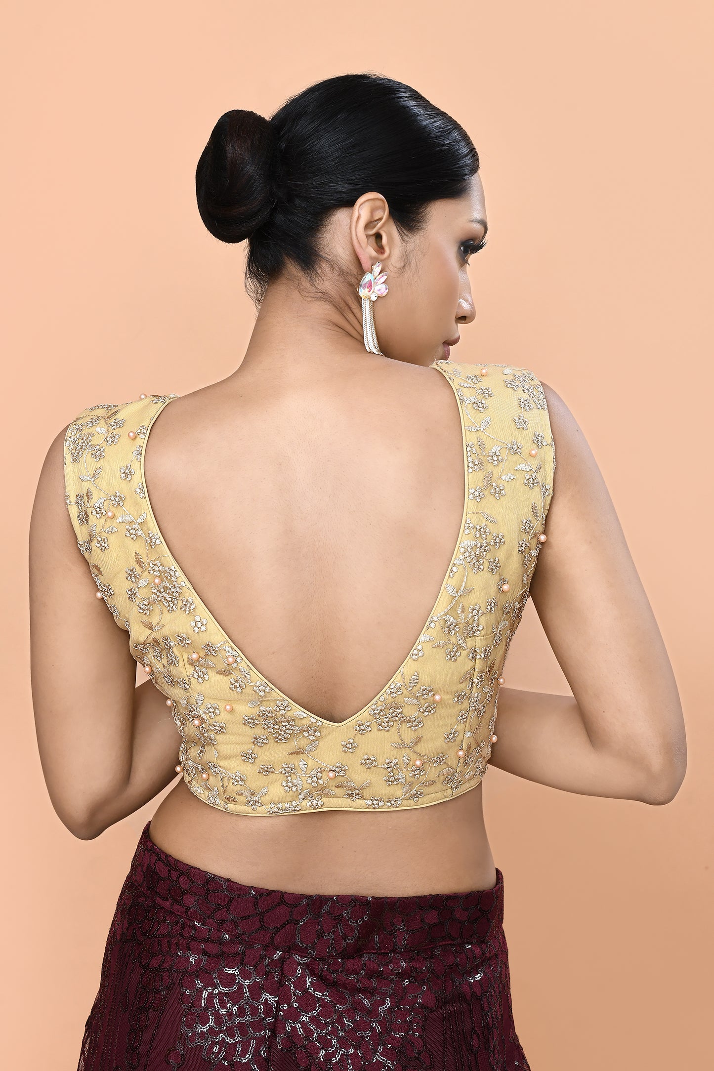 Designer Wear Maroon Net Palazzo With Golden Crop Top Set