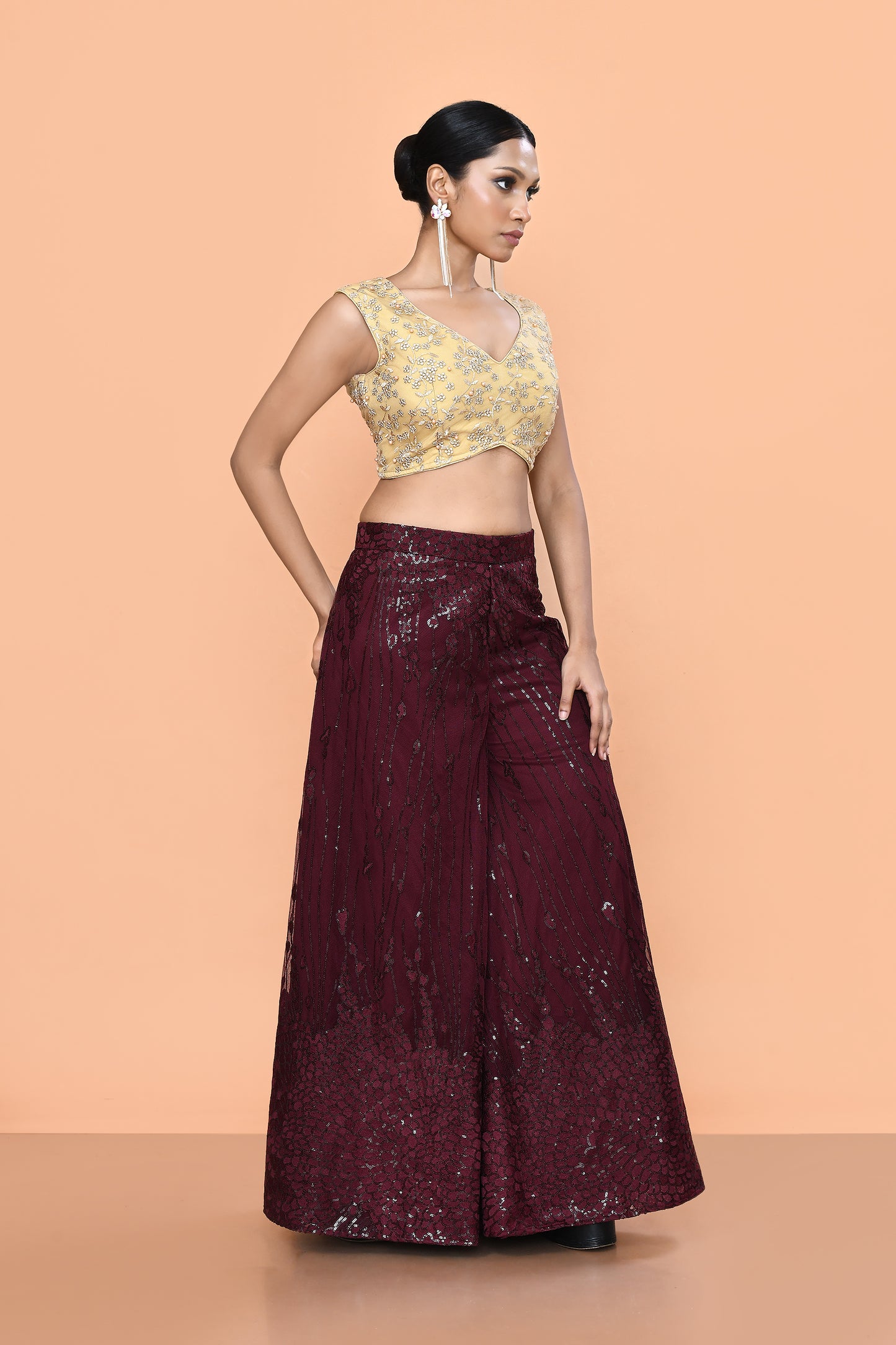 Designer Wear Maroon Net Palazzo With Golden Crop Top Set