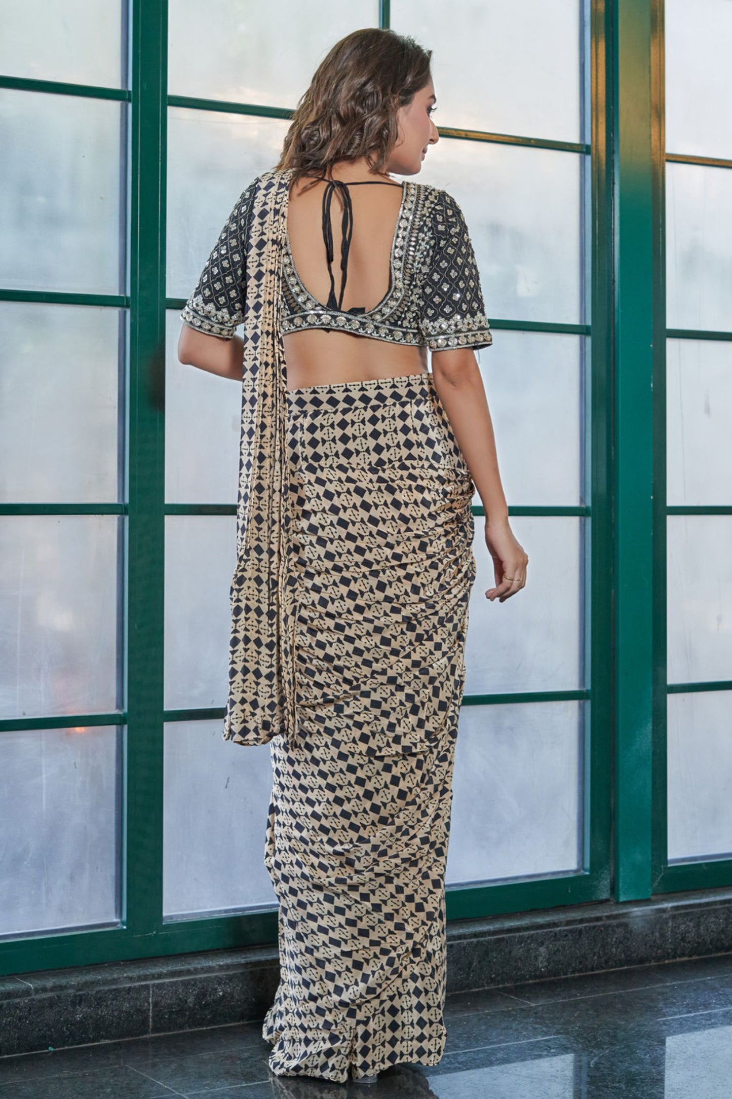 Cream & Black Crepe Drape Saree with Zardosi Blouse