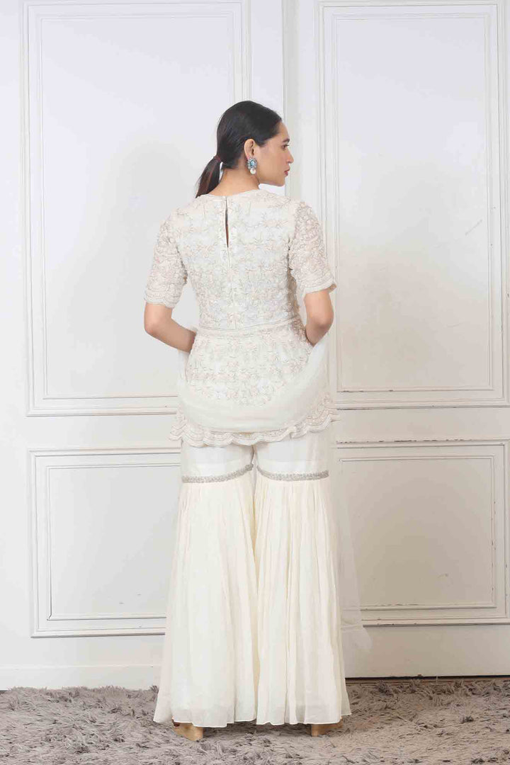 Party wear Sharara set in white color at online simaaya