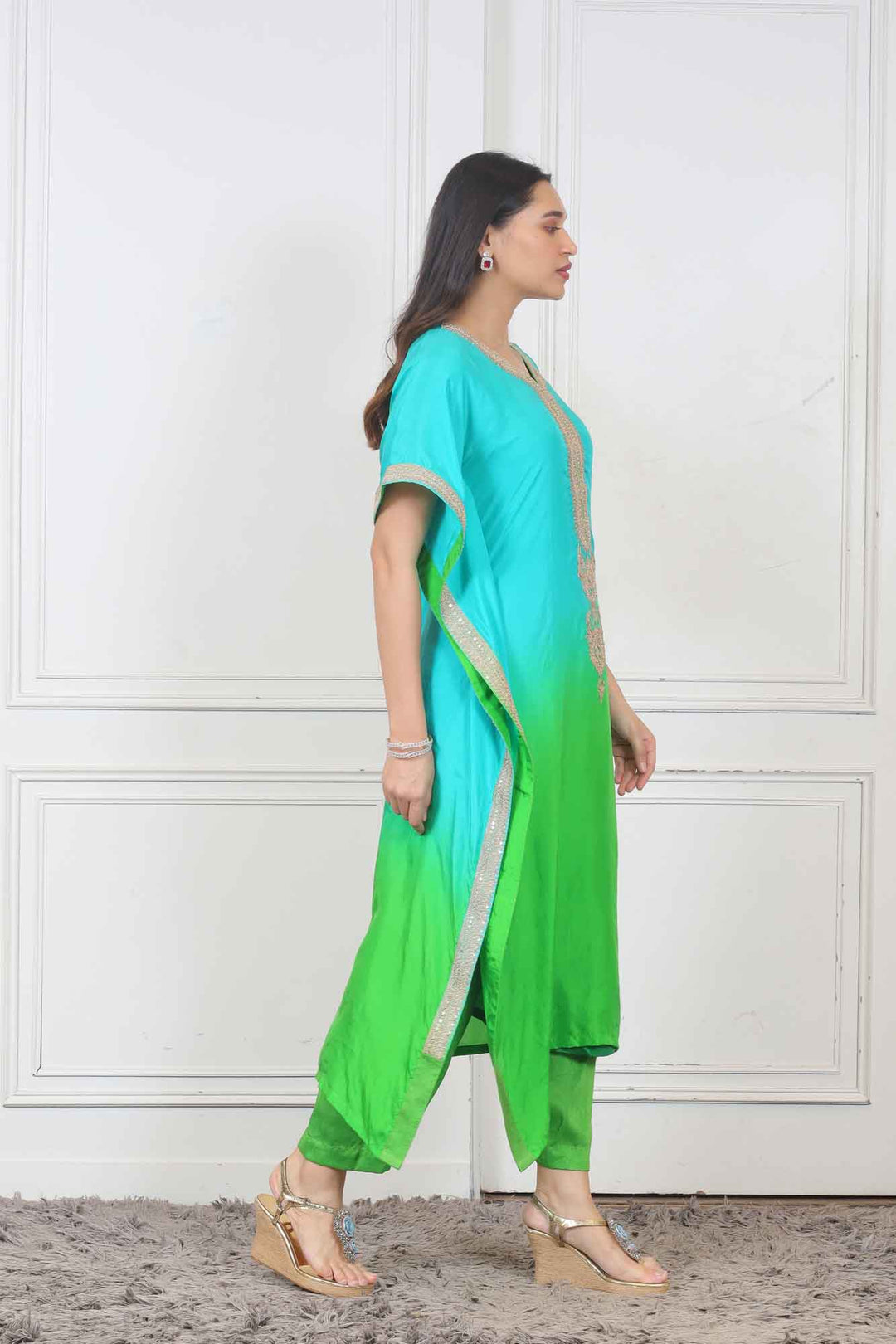 Party wear Kaftan Style Kurti in Green color at online Simaaya