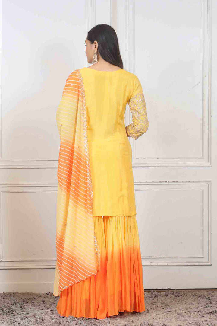 Party wear Sharara set in Yellow color at online simaaya