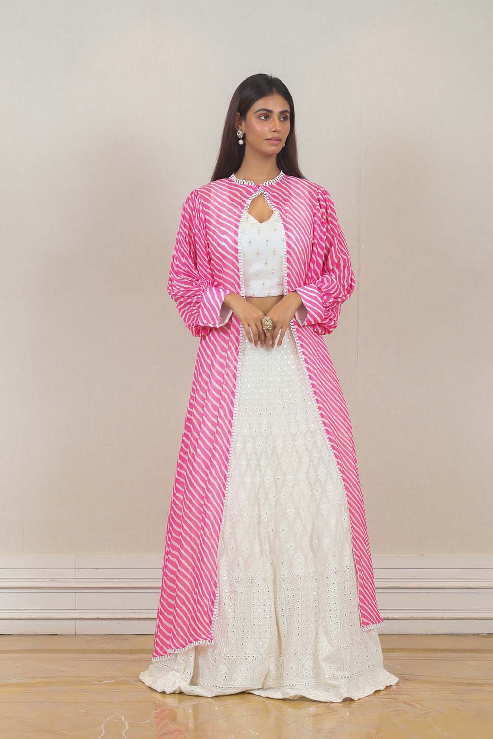 Party wear Lehenga with Cape in White color at online Simaaya